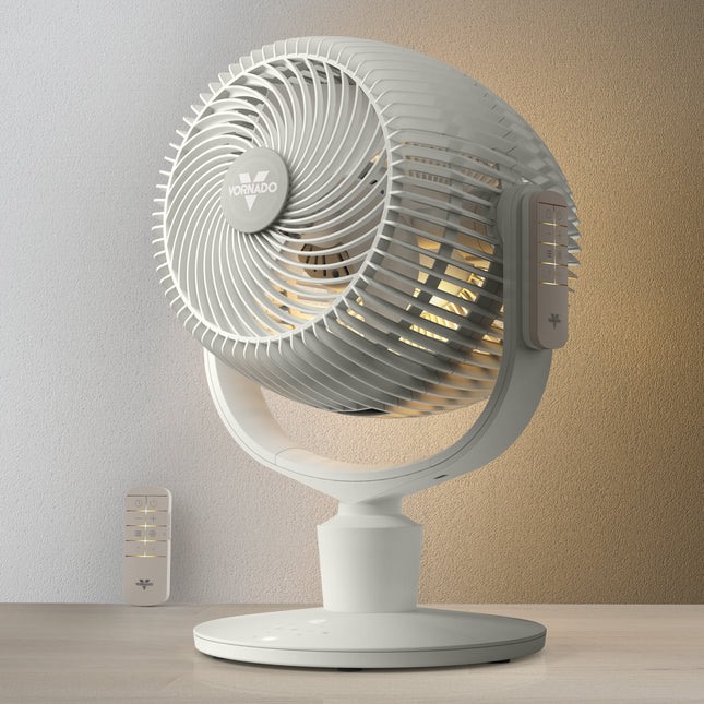 White Vornado fan on a wooden surface with a neutral background