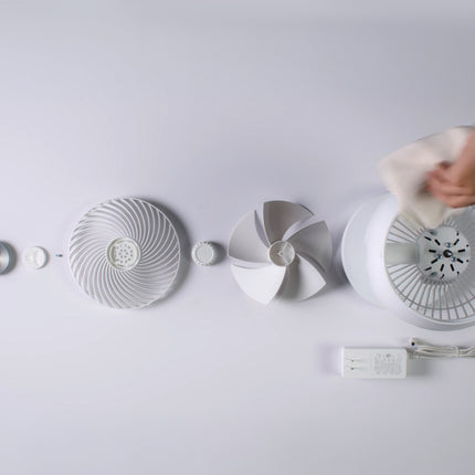 White fan with components on a light gray background