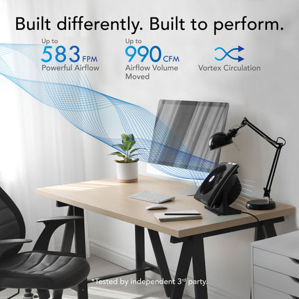 Desk setup with a computer monitor, keyboard, and lamp, featuring text about airflow performance.