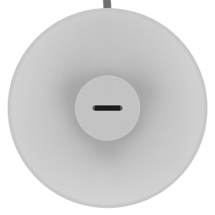 Round white object with a central cutout on a white background