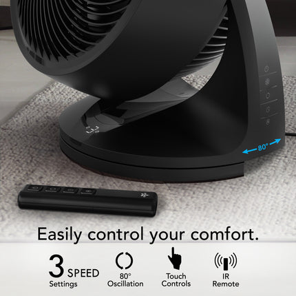 Black oscillating fan with remote control on a textured surface, featuring text 'Easily control your comfort.'