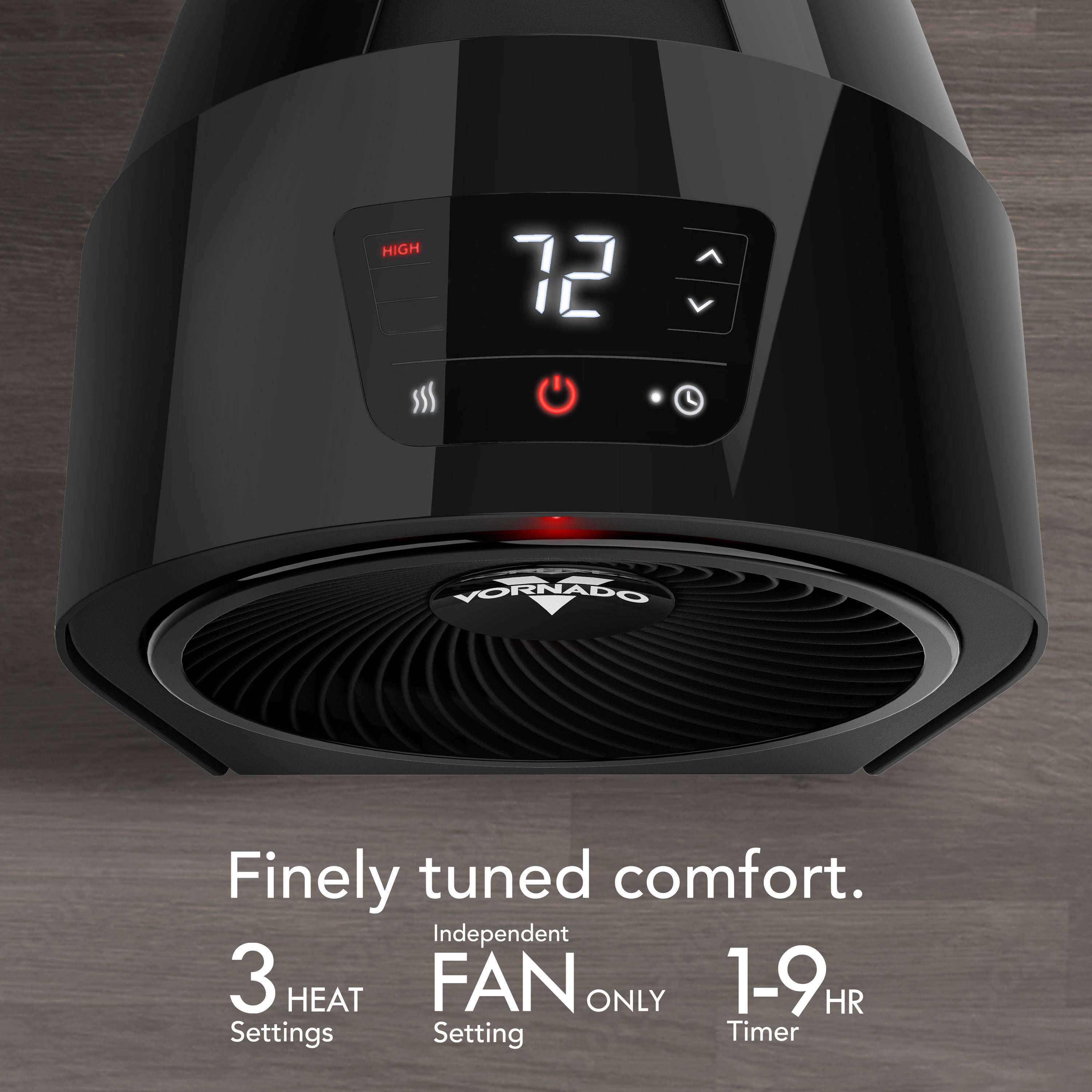 Black heater with digital display on a wooden surface, featuring the brand 'Vornado'.