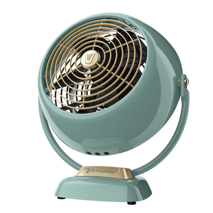 Vintage-style fan with teal body and gold accents on a white background