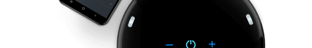 Atom 2W AE Compact Oscillating Tower Circulator with Wall Mount Controls with alexa opened on a phone next to it