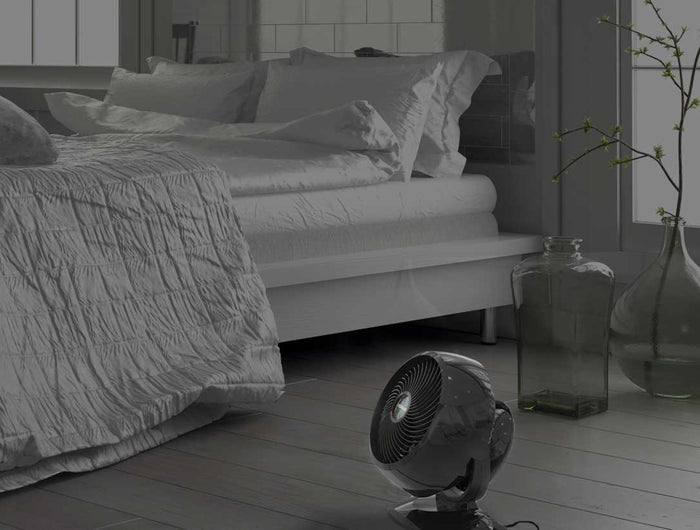 5303 on hardwood floor in a bedroom.