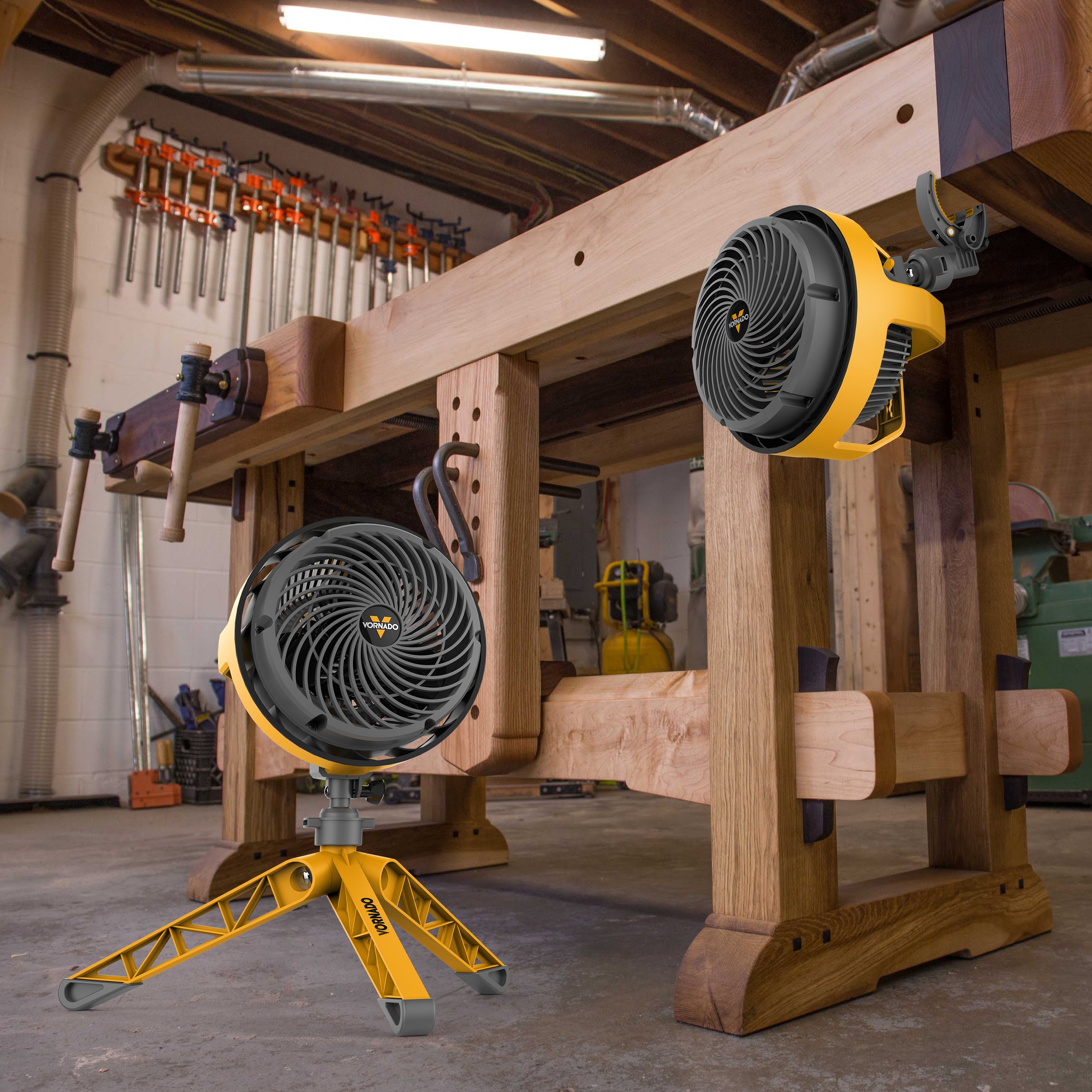 EXO5 in garage environment one with clip and one on tripod stand.