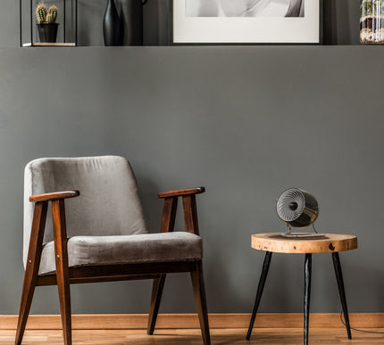 Pivot3 on side table next to chair in living area.