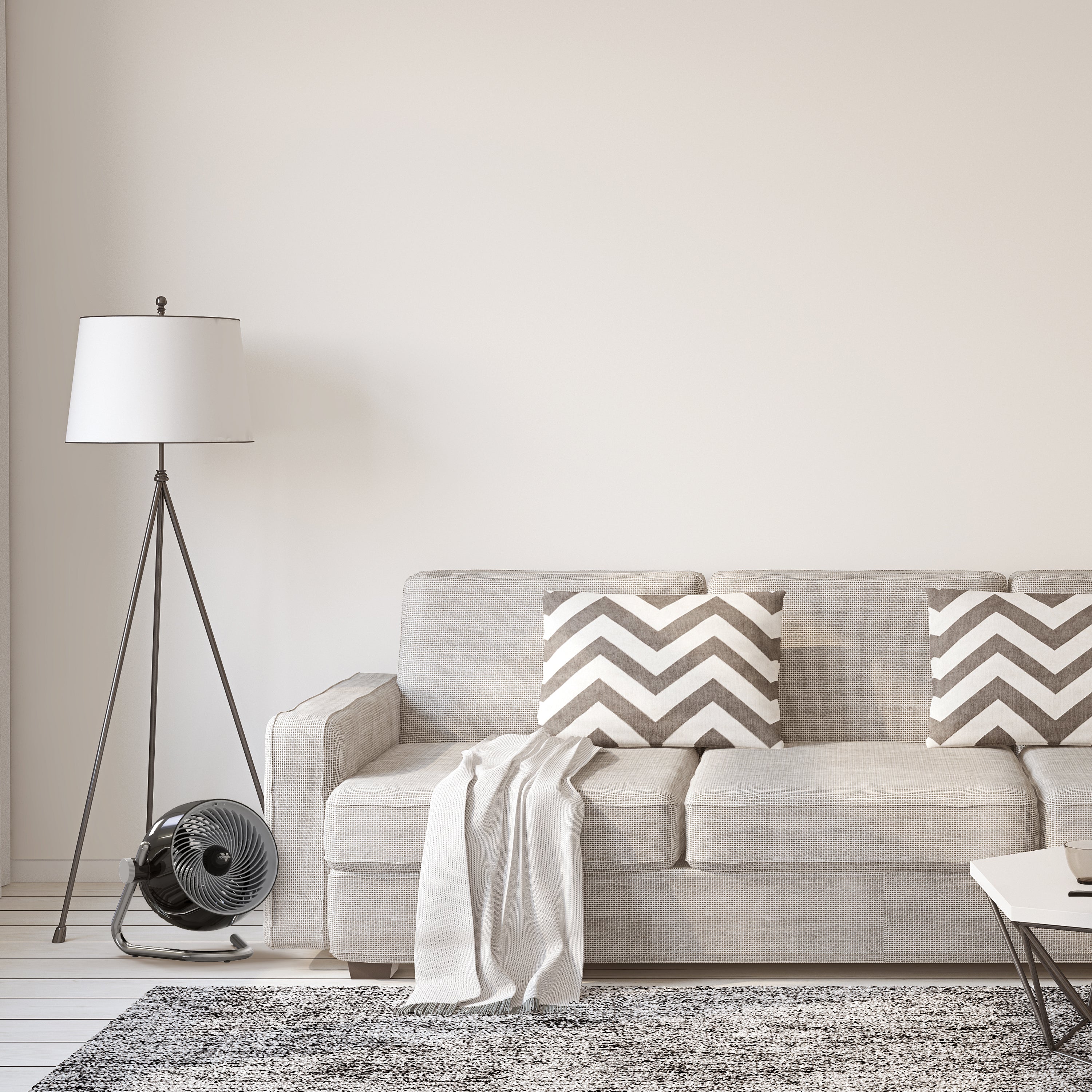 Pivot6 next to couch in a living room.