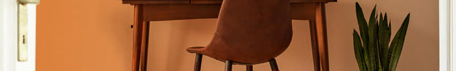 Study desk through an open door with an orange gradient to show whole room heat circulation. Rise 12H is on the floor.