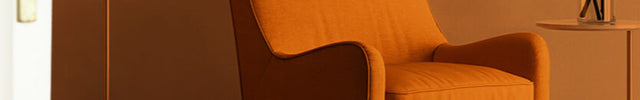 Chair seen through an open door with an orange gradient to show whole room heat circulation. Rise 20H is on the floor nearby.