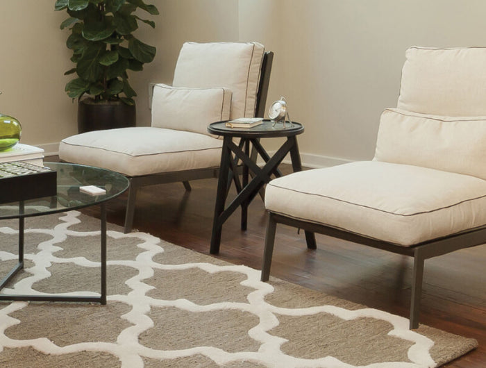 TAV10 in a living room near a chair.