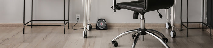 Lifestyle of VH202 on a wood floor under an office desk.