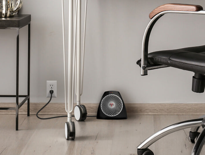 Lifestyle of VH202 on a wood floor under an office desk.