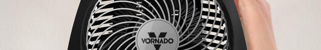 Hand on VH240's casing to show it's cool to touch while running