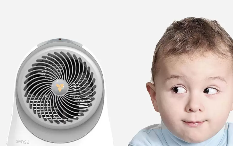 Sensa Sensing nursery heater with a baby looking at it