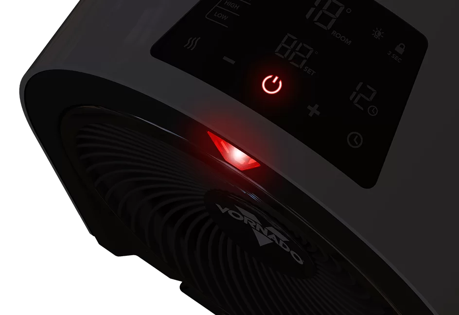 Top view of a black Velocity 5r heater's control panel. The power button is lit up red.