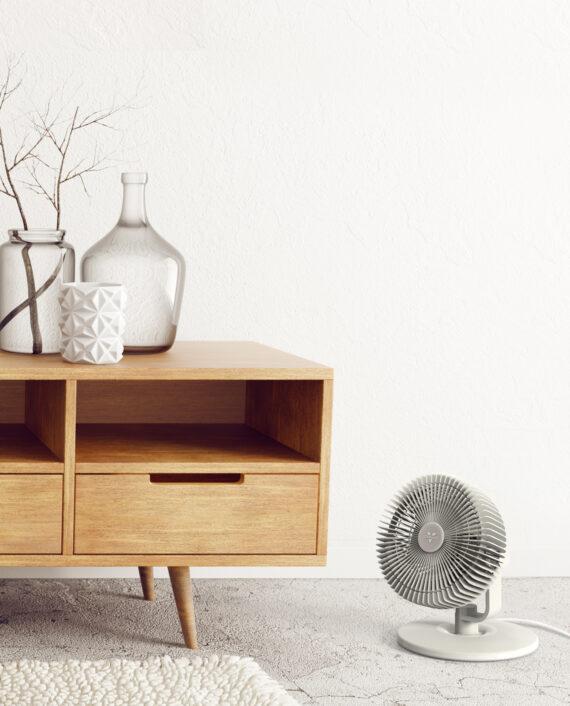 Vornado REFRESH 8 on the floor of a living room pushing air to the other side of the room